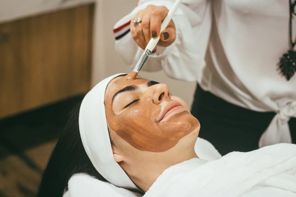 Skincare mask applied with a brush